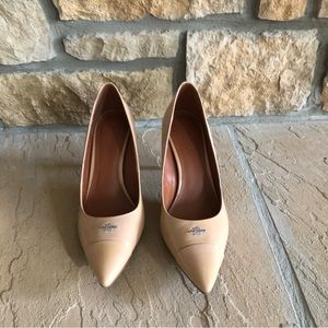 Tan pumps. 3 1/2 inch heel. Great condition